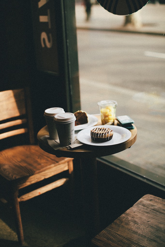 Table with coffee and pastries